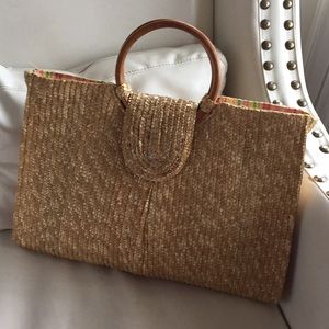 Woven bag with wood handle